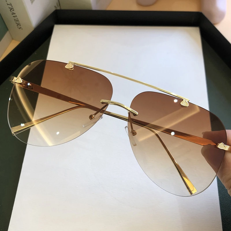 ヴィンテージリムレス合金航空パイロットサングラス男性用ブラン - Vintage Fashion Brands のレビューと価格