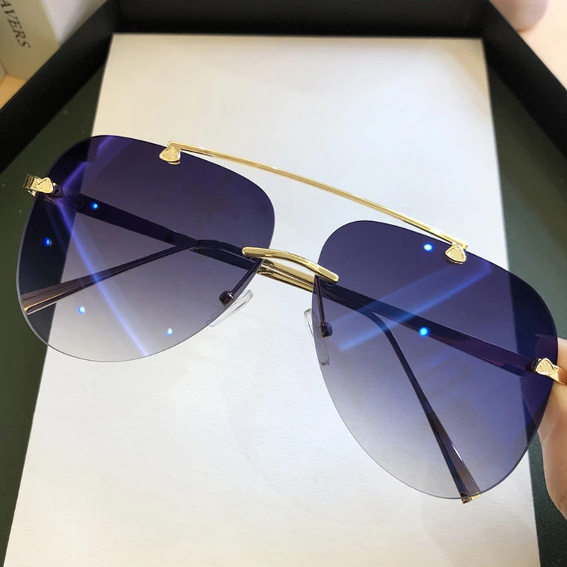 ヴィンテージリムレス合金航空パイロットサングラス男性用ブラン - Vintage Fashion Brands のレビューと価格
